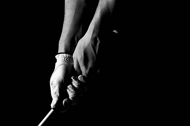 Golfer's hands stock photo