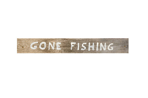Gone Fishing wooden sign stock photo