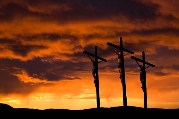 Good Friday  ... Three Crosses The Crucifixion at Calvary (Golgotha) near Jerusalem on Good Friday. Some copy space in the dramatic sunset. the crucifixion stock pictures, royalty-free photos & images