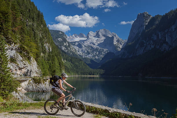 Gosau lakeside biking, Austria  dachstein mountains stock pictures, royalty-free photos & images