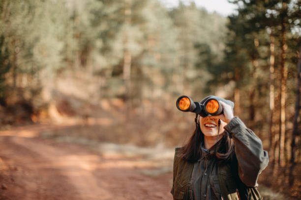 I got you Woman looking through binoculars scout camp stock pictures, royalty-free photos & images