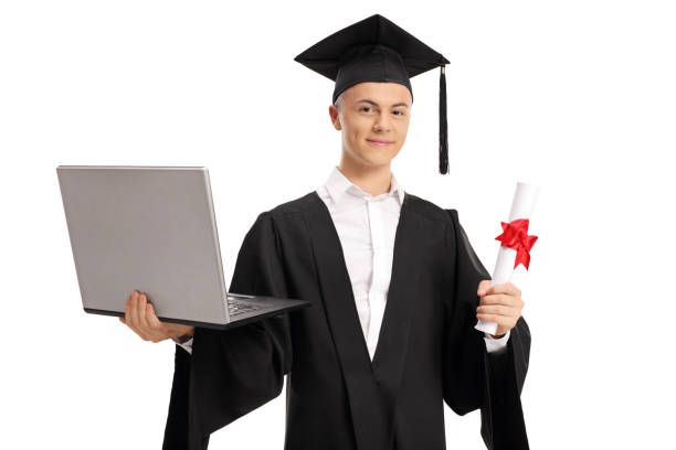 Graduate student holding a laptop and a diploma Graduate student holding a laptop and a diploma isolated on white background online degree stock pictures, royalty-free photos & images