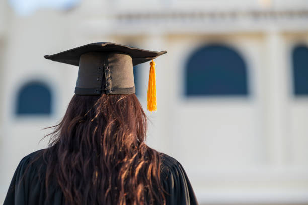 Graduates wear a black hat to stand for congratulations on graduation"t stock photo
