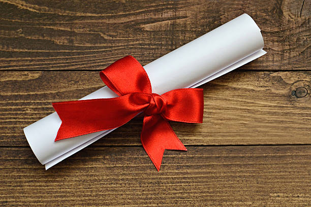 Rolled Up Diploma Stock Photos Pictures Royalty Free Images iStock Rolled Up Diploma Stock Photos Pictures Royalty Free Images iStock