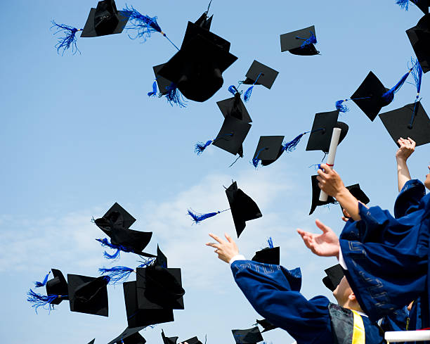 graduation high school graduation hats high throwing stock pictures, royalty-free photos & images