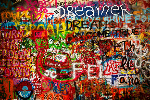 Graffiti Wall "Colorful graffiti wall in Prague, Czech RepublicThe Lennon Wall or John Lennon Wall" prague art stock pictures, royalty-free photos & images