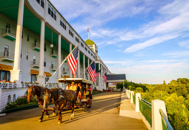 Grand Hotel Mackinac Island, Michigan, August 8, 2016: Grand Hotel on Mackinac Island, Michigan. The hotel was built in 1887 and designated as a State Historical Building. mackinac island stock pictures, royalty-free photos & images