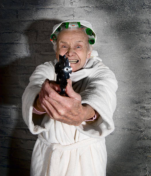 Old Woman Gun Stock Photos Pictures Royalty Free Images Istock