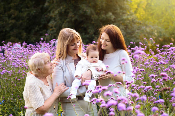 Grandmother, mother and kids. Four generations of women. Great...