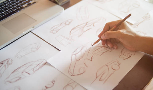 Graphic designer artist Work drawing sketch design development Prototype car Automotive industrial creative visual concept stock photo