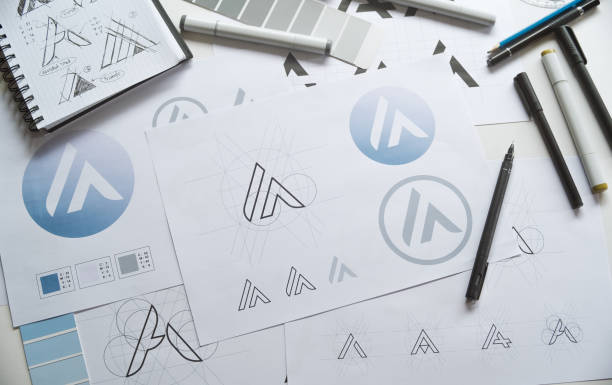Graphic designer creative design sketch drawing logo Trademark brand Workspace stock photo