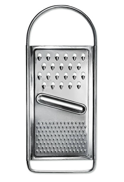 Grater isolated on white Kitchen utensil, grater with clipping path grater utensil stock pictures, royalty-free photos & images