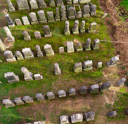 Old cemetery. Grave markers are blank and contain no writings or text.  Shot with Phantom 4 Pro, drone. 20MP camera.