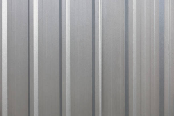 Gray background texture of galvanized steel plate wall for modern graphic design usage Gray background texture of galvanized steel plate wall for modern graphic design usage purpose external wall covering stock pictures, royalty-free photos & images