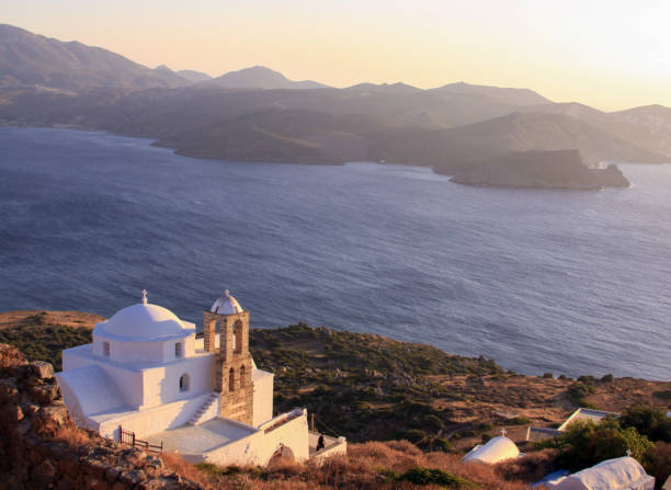 Greek church view from Plaka castle in Milos island stock photo