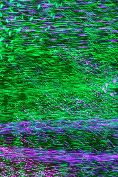 Green and Purple Light Streaks Long exposure motion capture steven harrie stock pictures, royalty-free photos & images