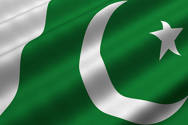 Green and white Pakistani flag with white moon and star Detailed 3d rendering closeup of the flag of Pakistan.  Flag has a detailed realistic fabric texture. pakistan flag stock pictures, royalty-free photos & images