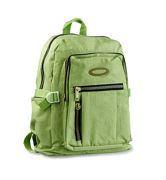 Green backpack isolated on white stock photo