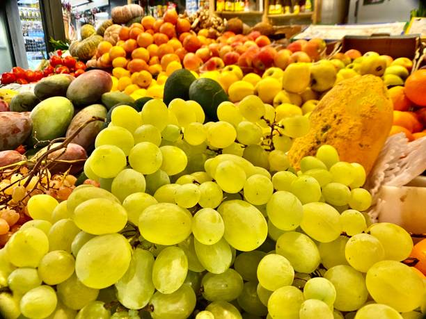 green bunches of grapes for sale at the mercato centrale firenze. stock photo