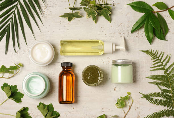 green cosmetic arrangement arrangement of natural herbal cosmetics on wooden background body care and beauty stock pictures, royalty-free photos & images