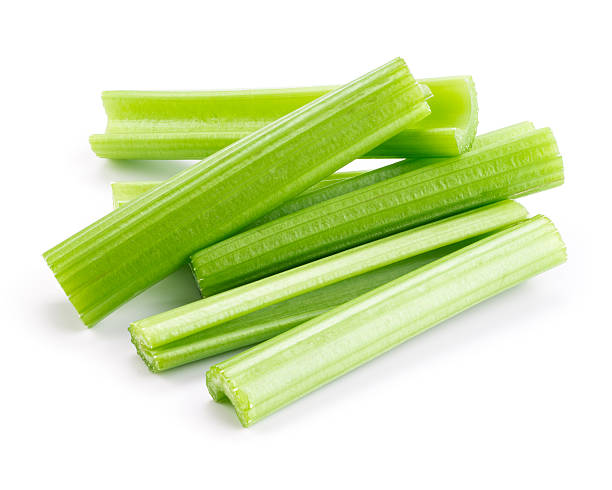Green fresh celery. Stick isolated on white. Green fresh celery. Stick isolated on white. celery stock pictures, royalty-free photos & images