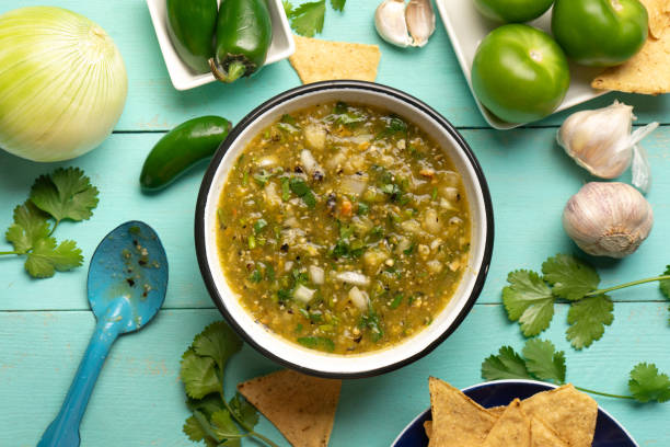 Green hot sauce with jalapeno pepper. Mexican food stock photo