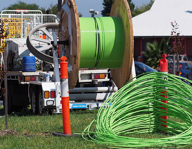 Green NBN fiber optic cable and installation truck stock photo