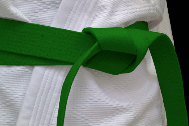 Green obi sash Close-up on a green belt tied around a kimono. bushido lifestyle stock pictures, royalty-free photos & images