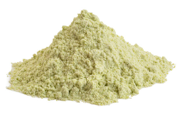 Green pea flour. Heap of dried green pea flour isolated on white. pea protein powder stock pictures, royalty-free photos & images