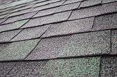 istock green shingles on the roof 1148885157