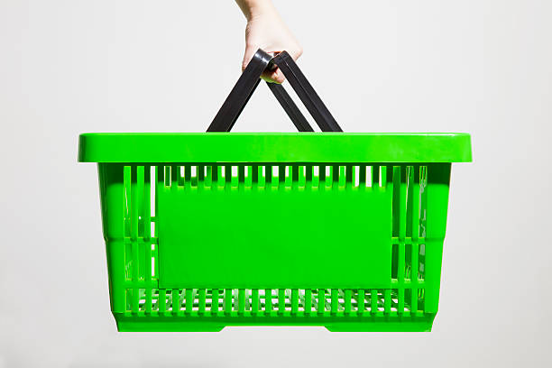 green shopping basket stock photo