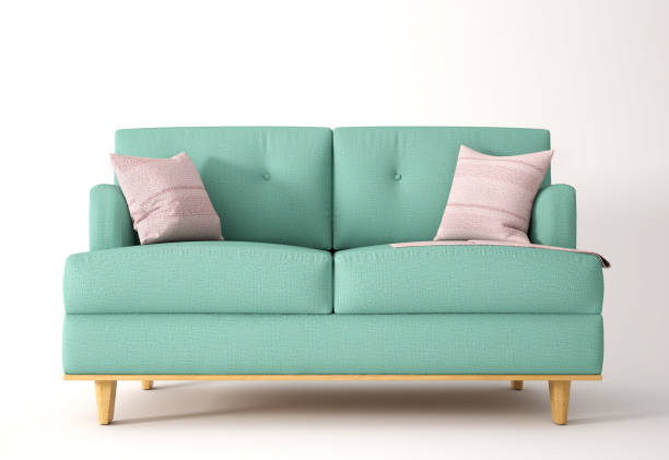 sofá verde sobre fondo blanco con una a cuadros y almohada, renderizado en 3d - sofá fotografías e imágenes de stock