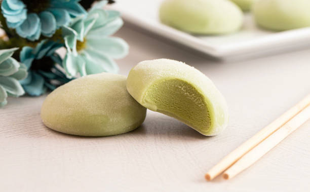 Green Tea Matcha Mochi Ice Cream on a Kitchen Table stock photo