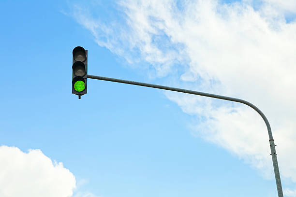green traffic light stock photo