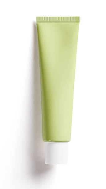 Green tube of hand cream on white background stock photo