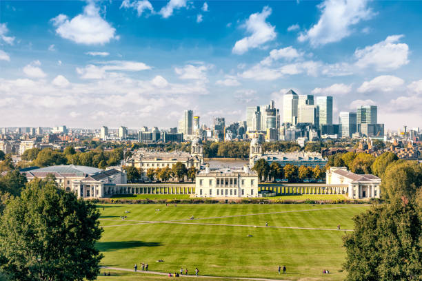 Greenwich College with the financial district of the Docklands in the background,  Greenwich Park. stock photo