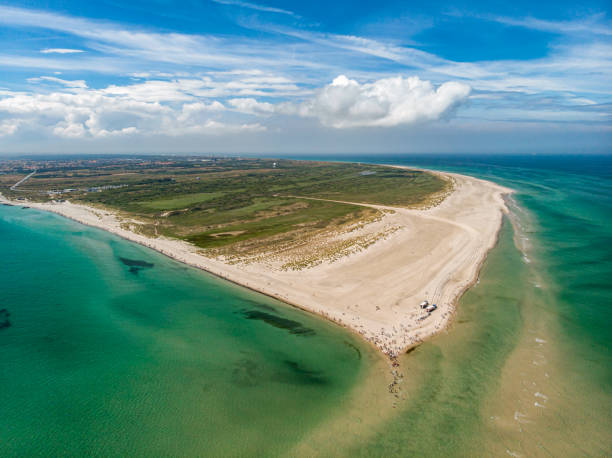 Grenen at Skagen Odde peninsula in Skagen The tip of Grenen at Skagen Odde peninsula in Skagen, Denmark. Grenen marks the junction between the North Sea and the Kattegat sea. jutland stock pictures, royalty-free photos & images