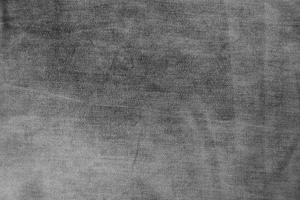 Grey denim jeans texture fabric background stock photo