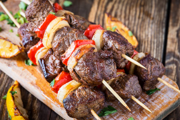 Grilled  beef shishkabab skewers Grilled  beef shishkabab skewers  with vegetables beef stock pictures, royalty-free photos & images