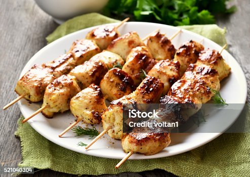 istock Grilled chicken on bamboo skewers 521040304