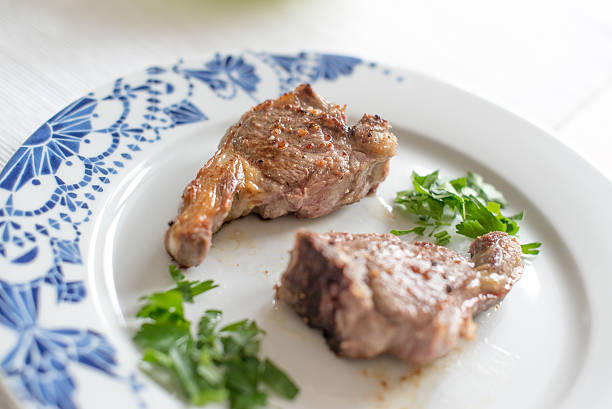 Grilled lamb steaks stock photo