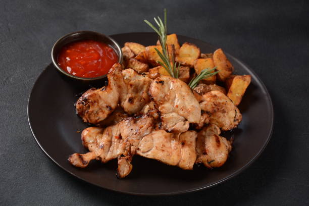 Grilled Marinated boneless skinless chicken thighs((Pargiot). Traditional Israeli dish Grilled Marinated boneless skinless chicken thighs((Pargiot). Traditional Israeli dish chicken thigh meat stock pictures, royalty-free photos & images