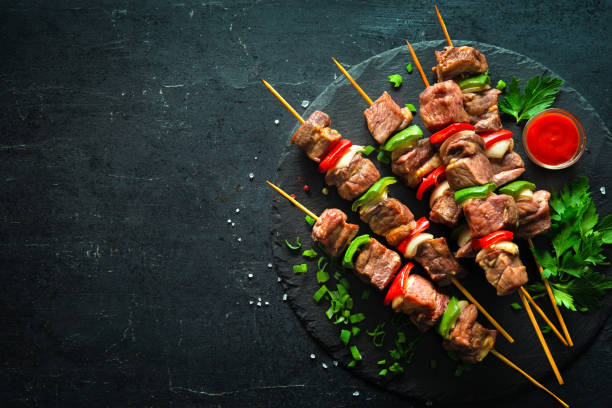 Grilled meat and vegetables on skewers Kebabs - grilled meat and vegetables on skewers Grilled Beef Kabobs With Vegetables stock pictures, royalty-free photos & images