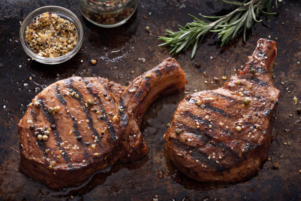 Grilled pork chops with spices stock photo