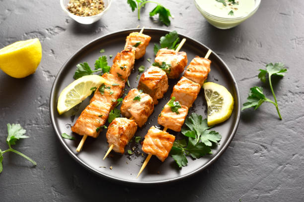 Grilled salmon skewers stock photo