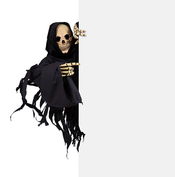 Grim Reaper with sign stock photo