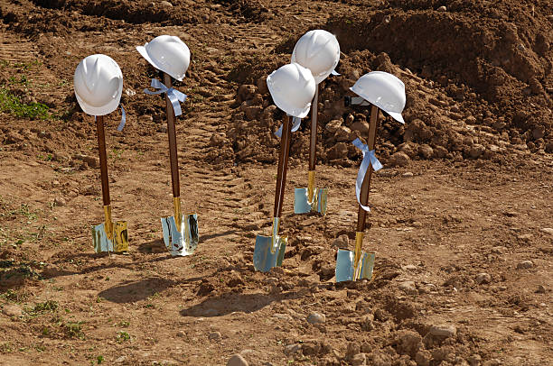 Groundbreaking Shovels and hardhats at a groundbreaking ceremony stock pictures, royalty-free photos & images