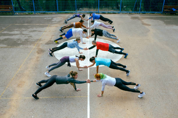 Group Fitness Class Outdoors stock photo