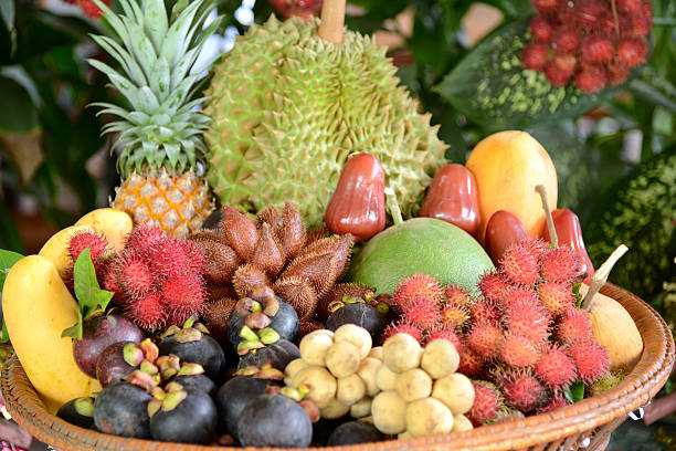 Group of Asian or Tropical fruit in basket, Thailand stock photo