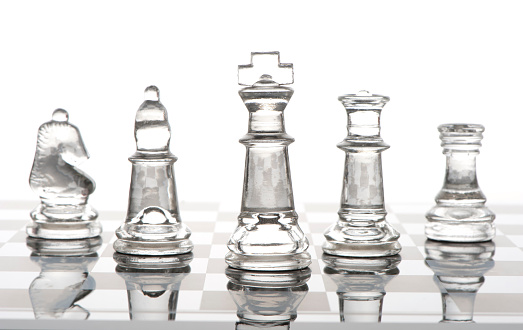 Group Of Clear Glass Chess Pieces Stock Photo - Download Image Now - iStock